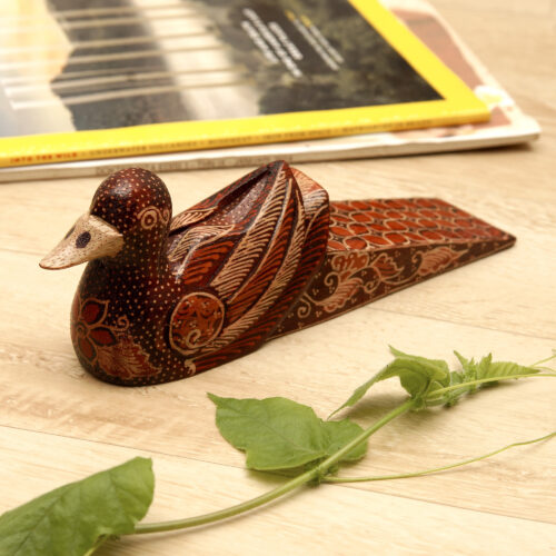 Handmade Batik Duck-Shaped Pule Wood Door Stop in Warm Hues, 'Duck Dimension'