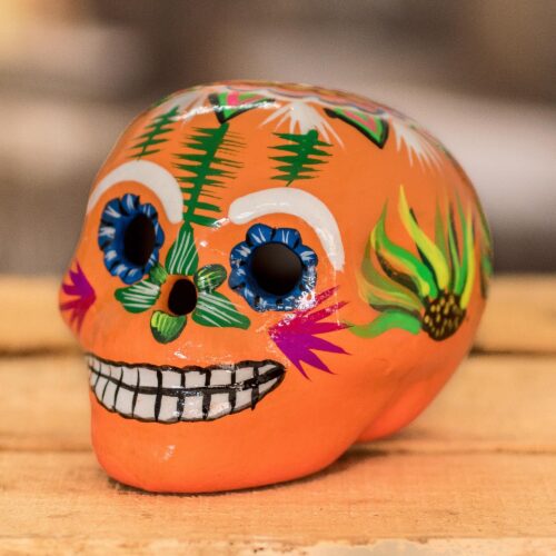 Handmade Guatemalan Figurine, 'Smiling Skull'