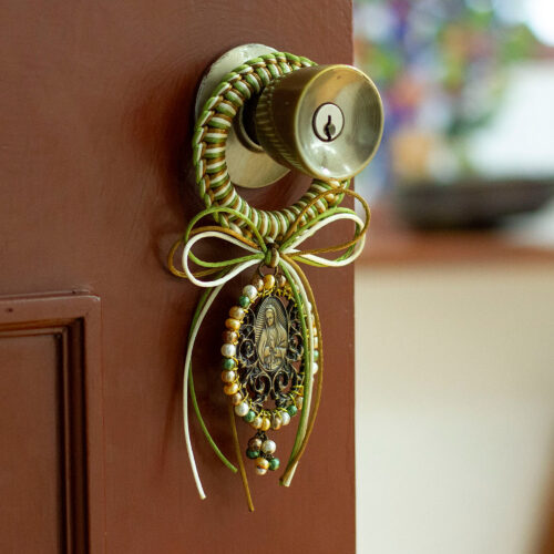 Religious Green and Brown Glass Beaded Door Knob Hanger, 'Guadalupe's Emblem'